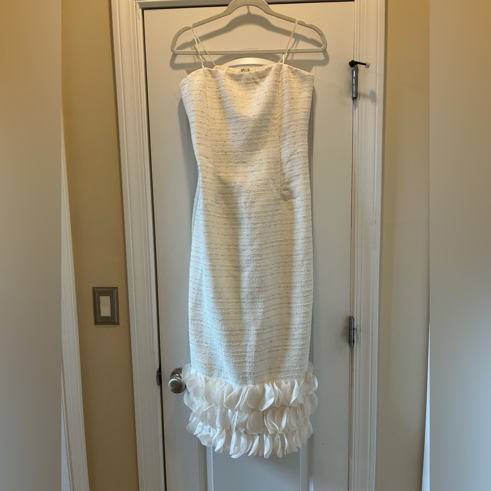 Elegant White Strapless Dress with Ruffle Hem